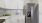 a kitchen with white cabinets