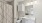 a bathroom with a shower and sink