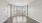 a room with white walls and a wood floor