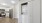 a kitchen with white cabinets