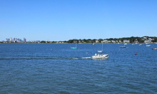 a group of boats on the water