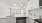 a kitchen with white cabinets