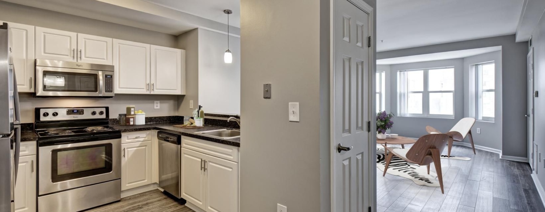 a kitchen with white cabinets
