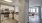 a kitchen with white cabinets