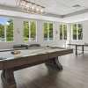 a room with tables and chairs
