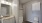 a bathroom with a shower and sink