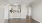 a kitchen with white cabinets